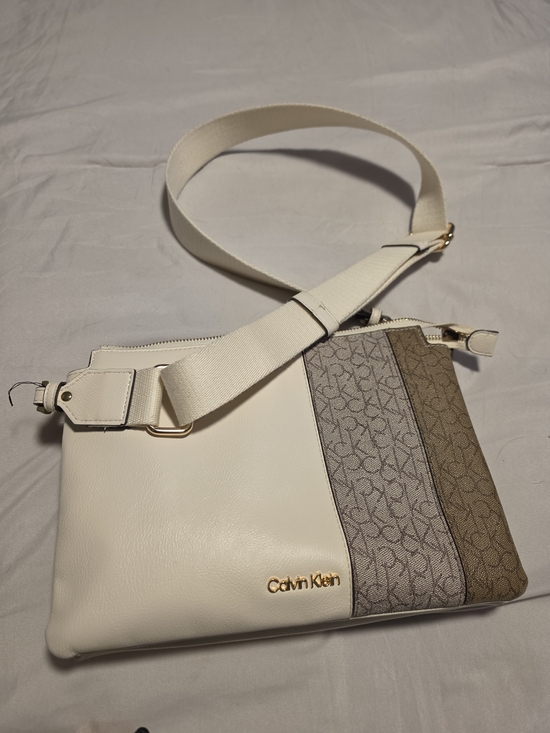 Calvin Klein Handbags - Calvin Klein Cream Crossbody with Signature Logo Panels